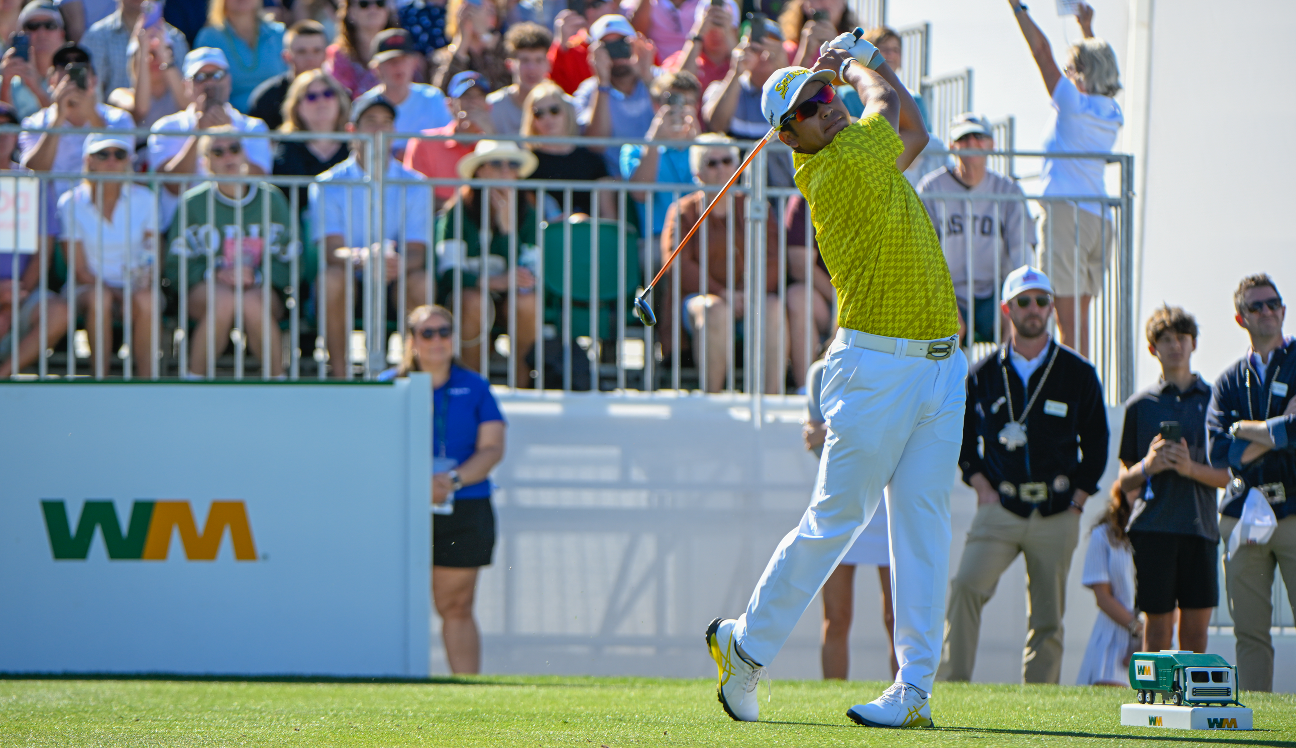 Hideki Matsuyama hits an iron shot off the tee