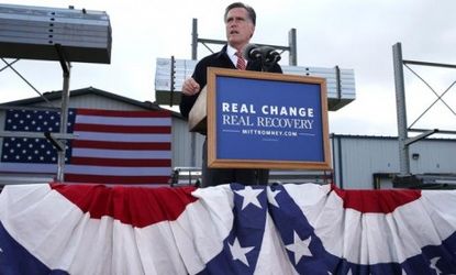 Mitt Romney at an Iowa lectern outfitted with his new motto on Oct. 26.