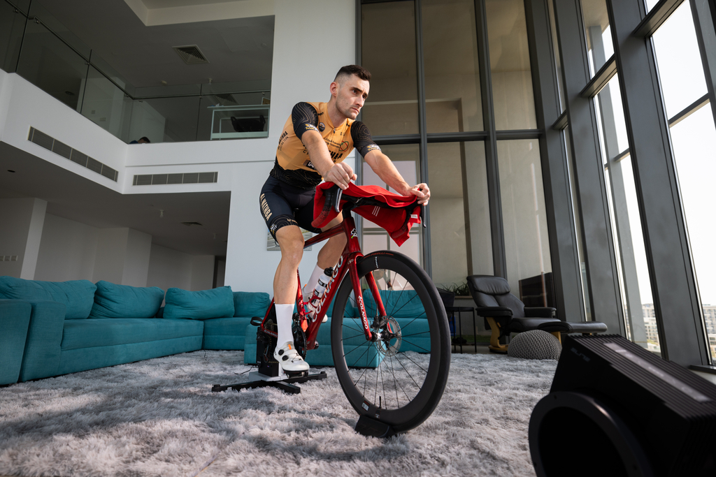A rider using MyWhoosh indoors