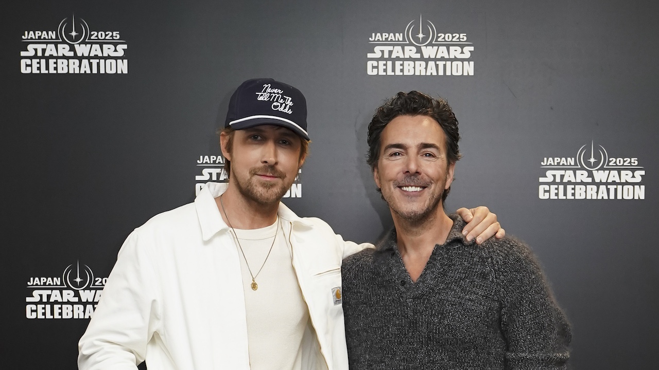 Shawn Levy and Ryan Gosling smiling at Star Wars Celebration
