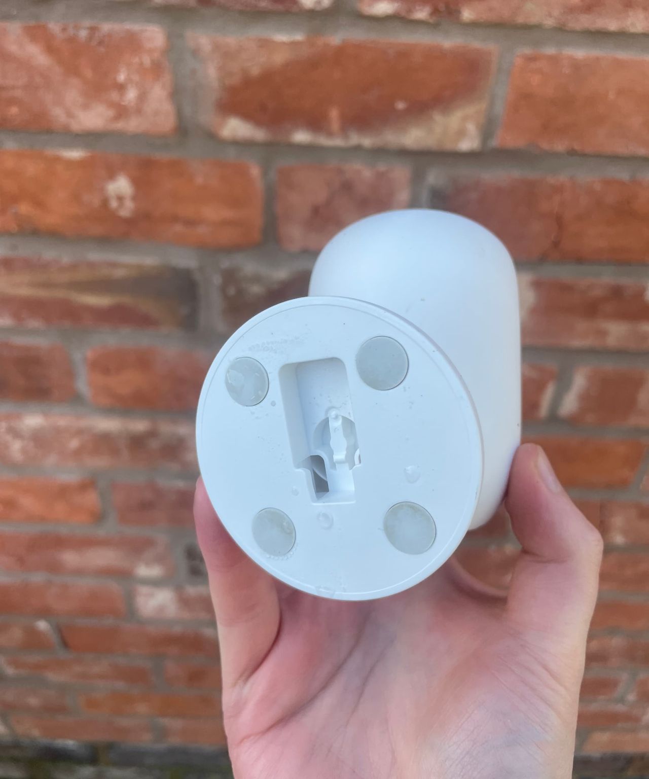 A eufy C35 camera with magnetic strips on the back