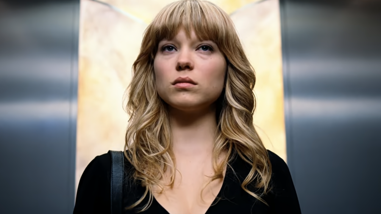 Léa Seydoux in an elevator with a straight face in Mission: Impossible - Ghost Protocol