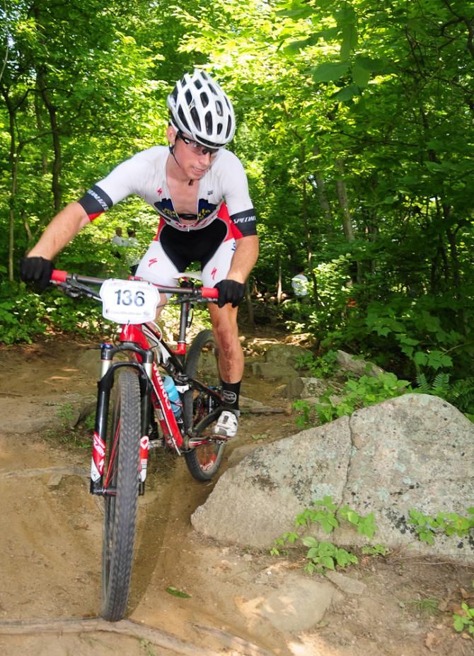 Sean Bennett (Whole Athlete/Specialized) dodging boulders on the descent