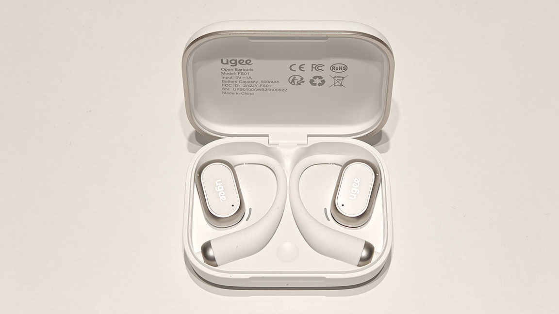 Ugee FreSound; open earbuds on a white table
