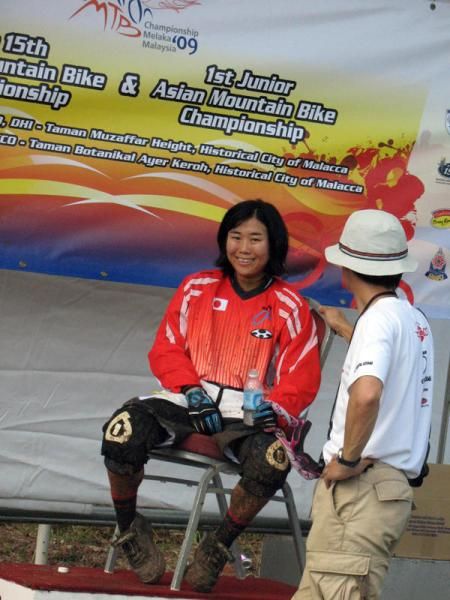 Mio Suemasa (Japan) is all smiles after winning the elite women's downhill.