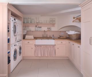 Laundry room in pale pink