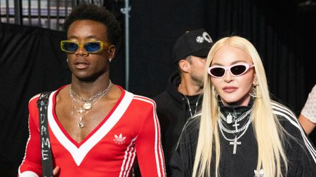 David Banda and Madonna attend the WBA World Lightweight Championship title bout between Gervonta Davis and Rolando Romero at the Barclays Center in Brooklyn on May 28, 2022 in New York City. 