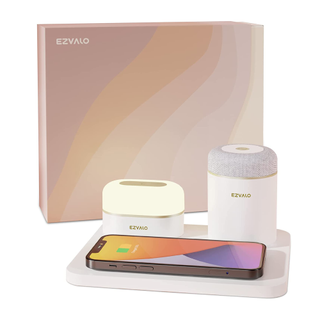 A white 3-in-1 charger, lamp, and Bluetooth speaker with a neutral wavy box