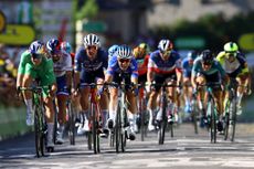 Jasper Philipsen tops Wout van Aert and Mads Pedersen to win stage 15 of the Tour de France.