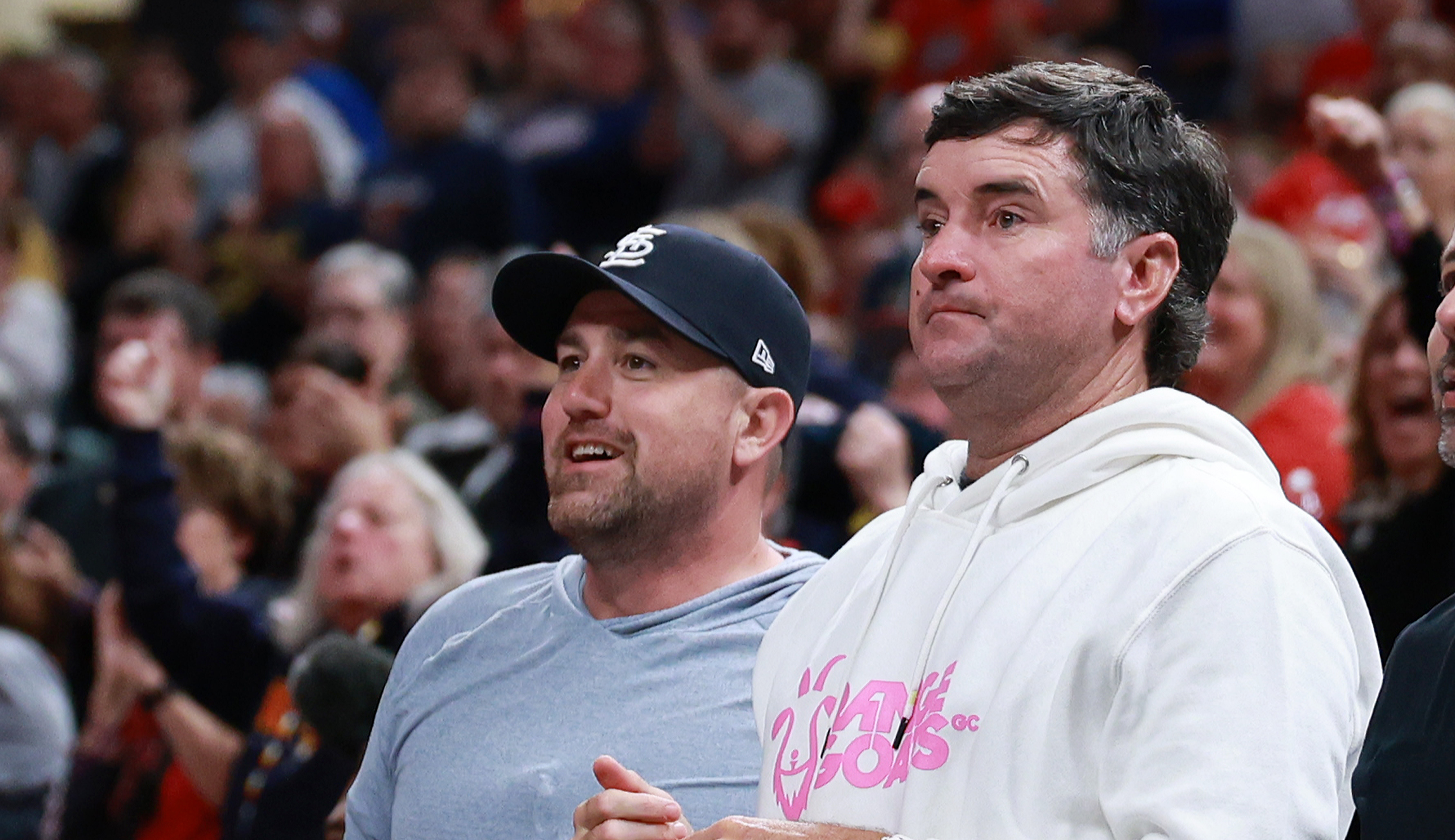 Bubba Watson watches on during a WNBA game