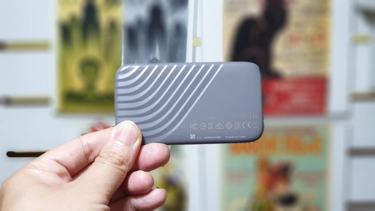 Western Digital My Passport SSD in a masculine hand
