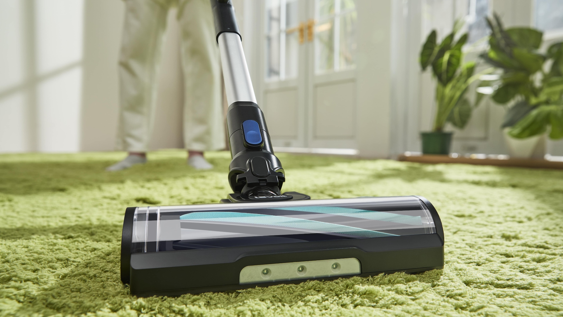 The Levoit cordless vacuum being used on a carpet