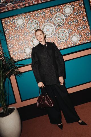 Kelly Rutherford at a Jimmy Choo dinner