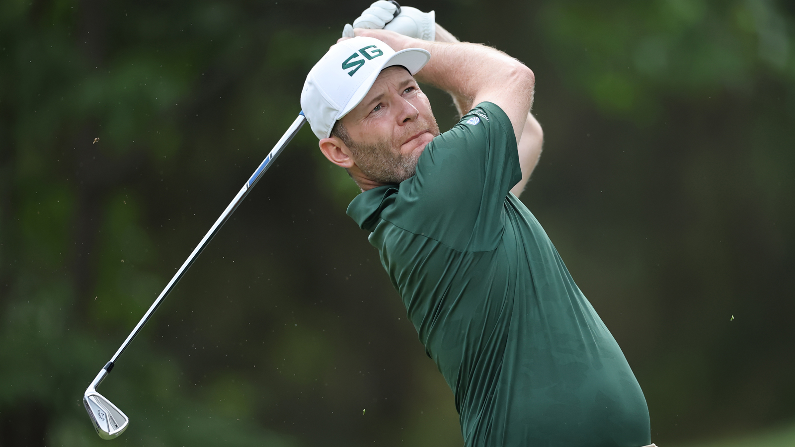 Branden Grace hits an iron shot