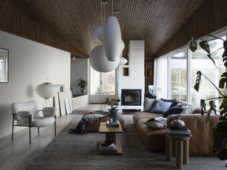 Scandinavian living room with wallpaper by Borastapeter