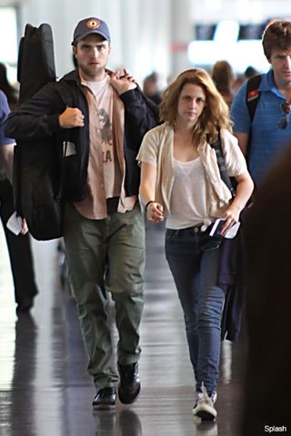 Robert Pattinson & Kristen Stewart stop hiding romance - Rob, Kristen, R-Patz, K-Stew, spotted, together, airport, LAX, Montreal, kissing, Twilight, see, pics, pictures, best moments, couple, public, relationship, Marie Claire