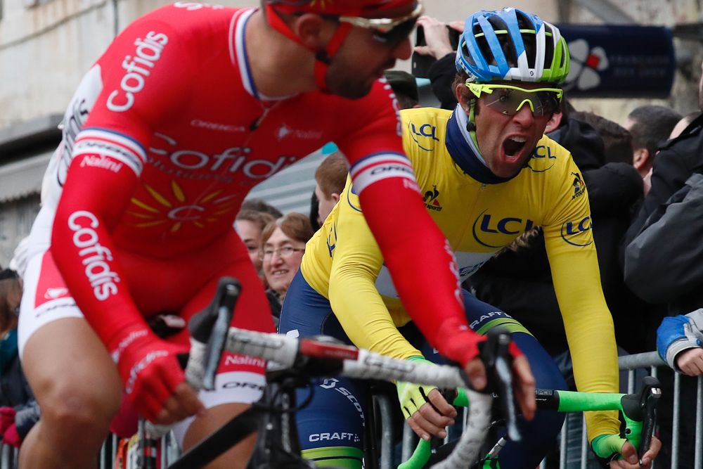 Michael Matthews reacts after Nacer Bouhanni swerved into him before Matthews crossed the finish line to come in first during the second stage