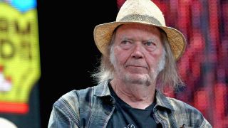 Neil Young onstage at Farm Aid in 2019