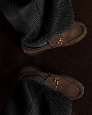 @brittanybathgate wearing brown Gucci horsebit loafers