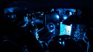 An internal photo shows the lasers of the Antihydrogen Laser Physics Apparatus (ALPHA) antimatter experiment at work.