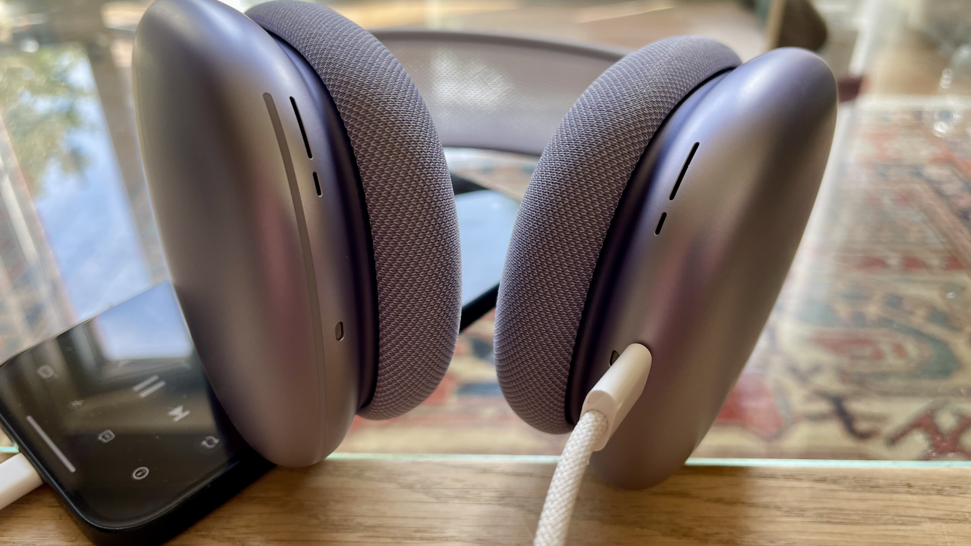 AirPods Max in purple hooked up to a source via USB-C