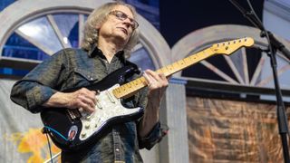 Sonny Landreth performs during the New Orleans Jazz and Heritage Festival 2019 50th Anniversary at Fair Grounds Race Course on MAY 3, 2019 in New Orleans, Louisiana.