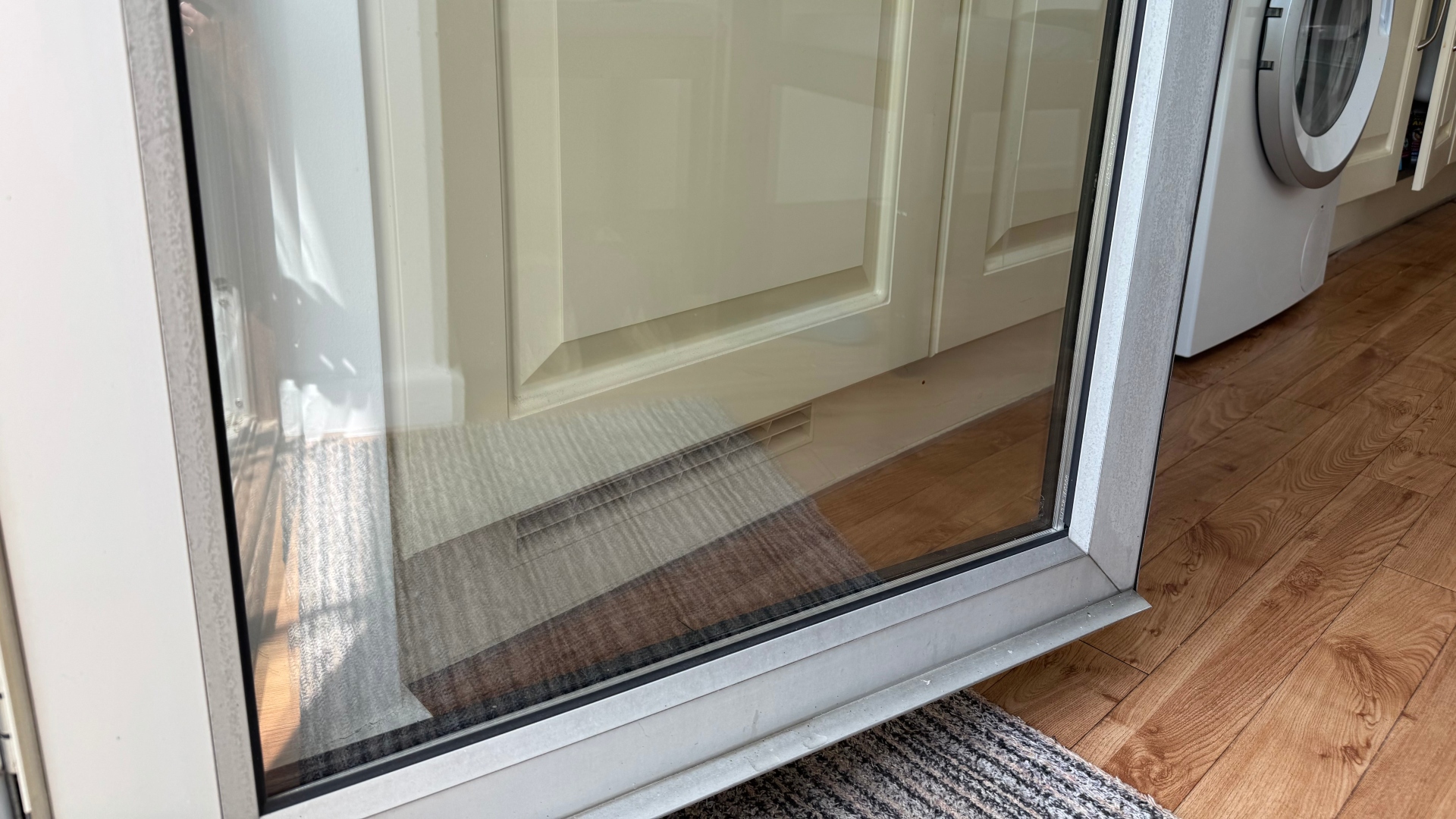 Using newspaper and vinegar to clean a window