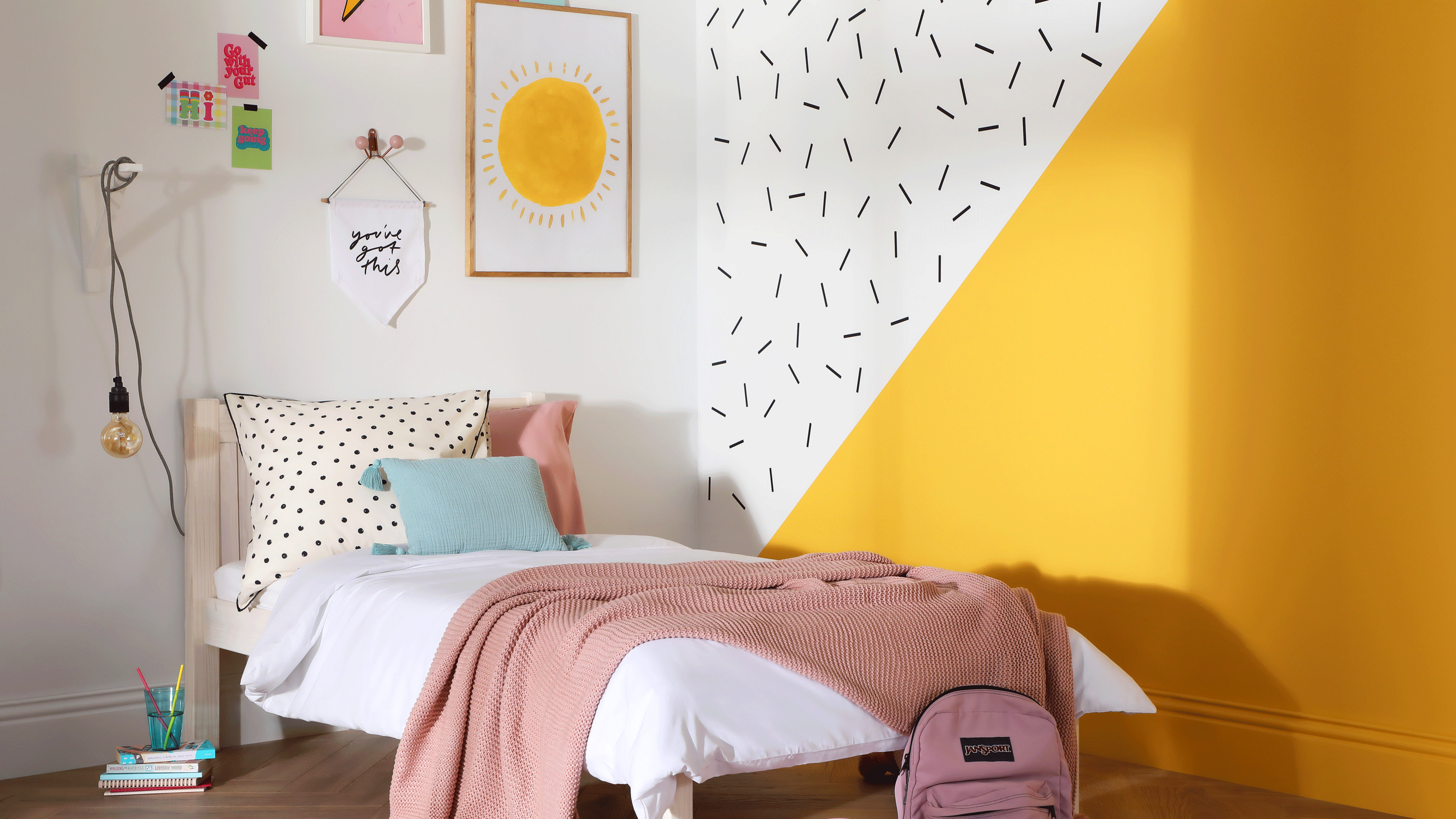 Kid's bedroom with color painted zones and washi tape decor on walls.