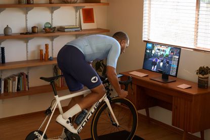 Man cycling on an indoor bike 