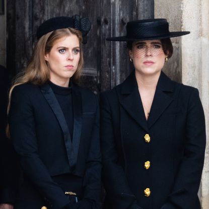 Princess Beatrice and Princess Eugenie both look sad while wearing black outfits