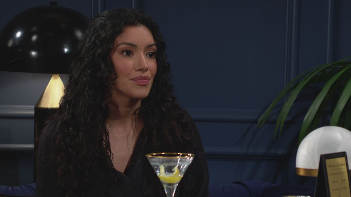 Zuleyka Silver as Audra having a drink in The Young and the Restless