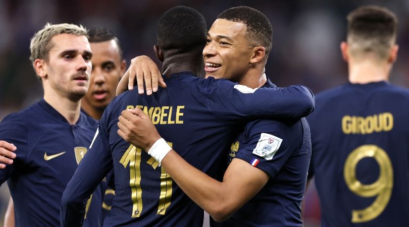 Kylian Mbappe is congratulated by his France team-mates after scoring his side&#039;s second goal against Poland in the last 16 of the 2022 World Cup in Qatar,