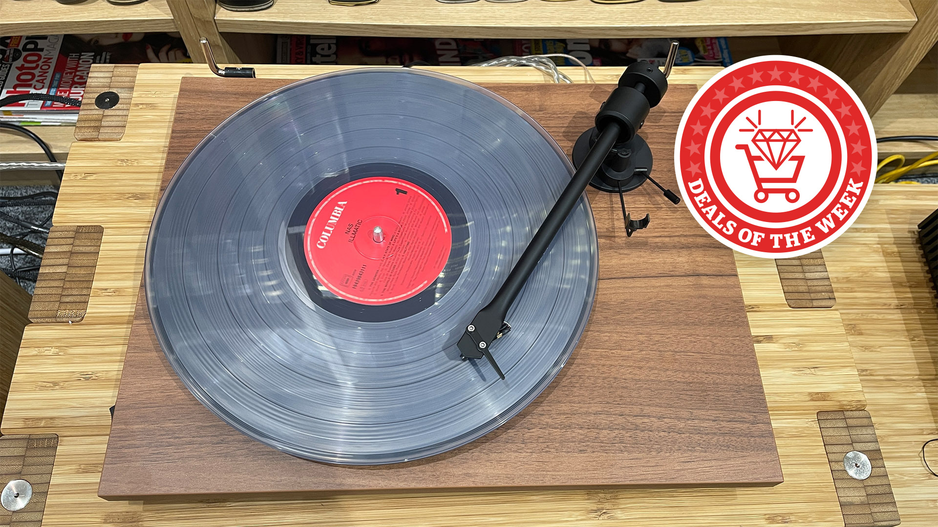 A picture of the Pro-Ject T1 Evo BT turntable with the deals of the week logo overlaid
