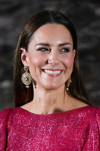 Kate Middleton headshot with a straight middle parting hairstyle