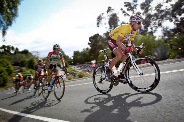 Ben Day (Kenda p/b Geargrinders) at the front of the group heading into the climb.