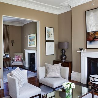 living room with brown walls