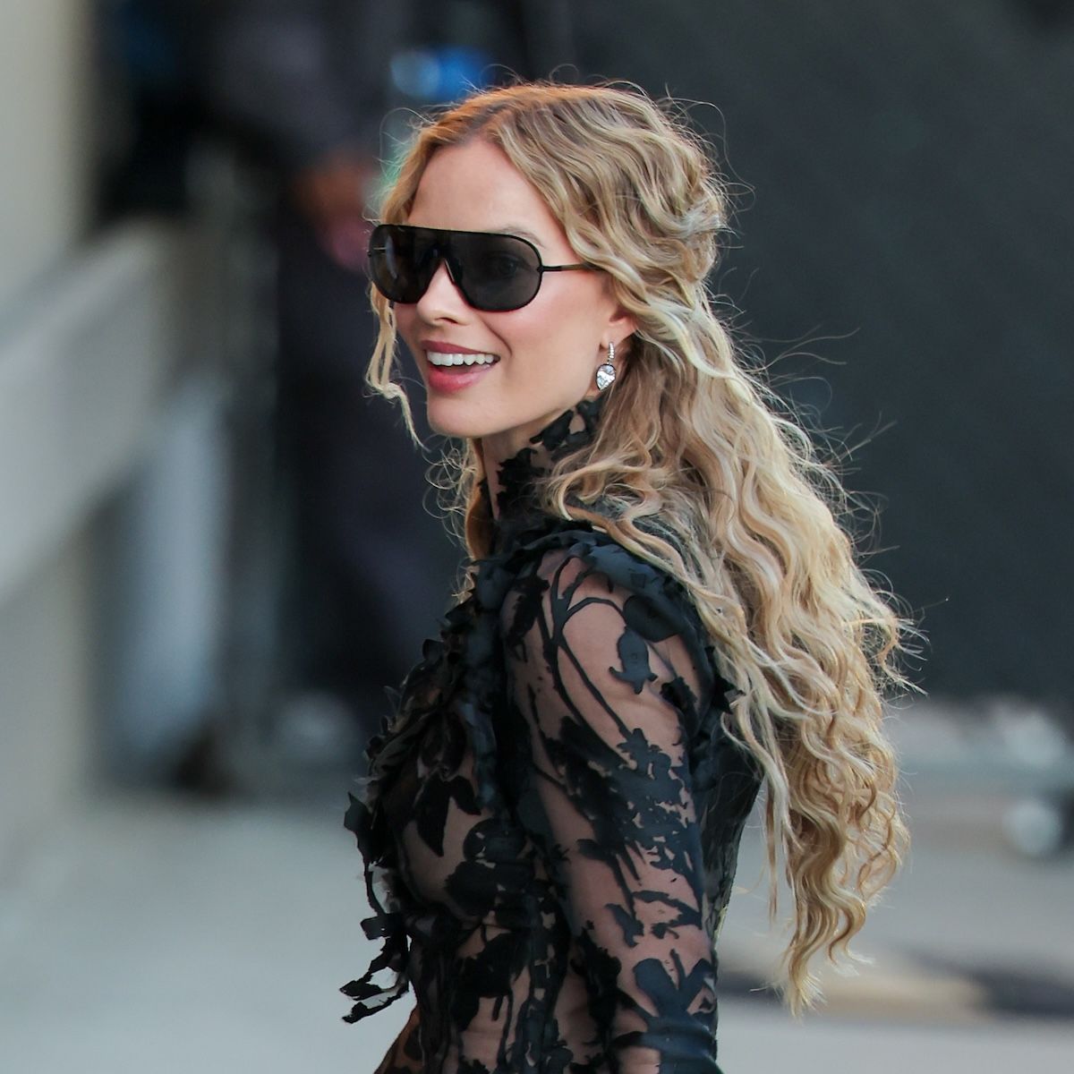 Margot Robbie with long, windswept waves