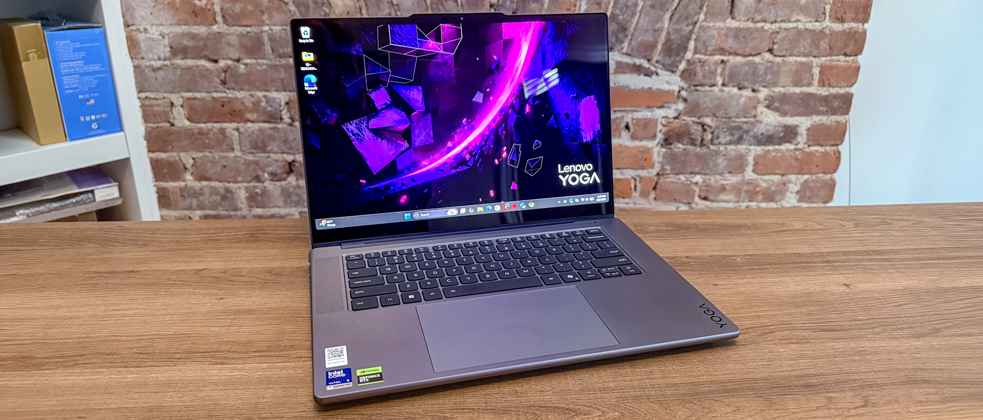 The Lenovo Yoga Pro 7i Gen 11 Aura Edition on a desk