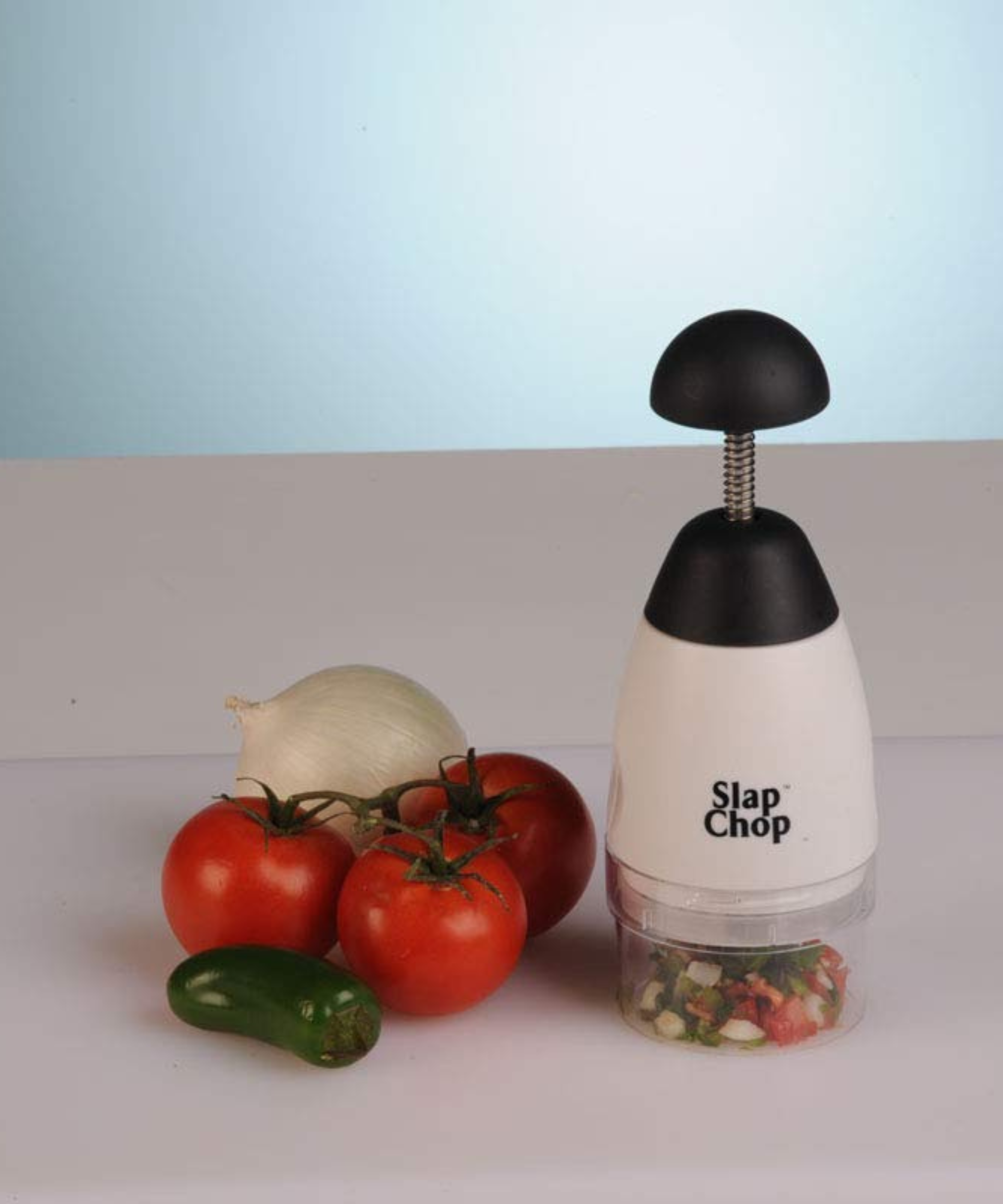 Using a Slap Chop to grind nuts and chop fruit for ice cream.