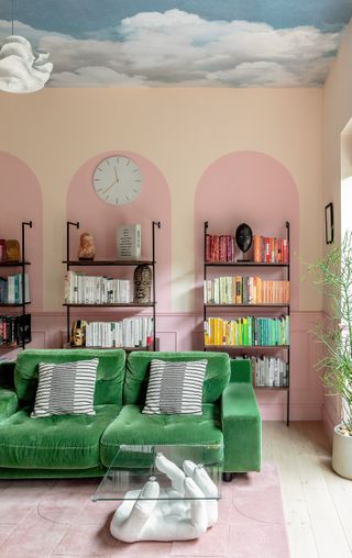 green sofa in pink living room