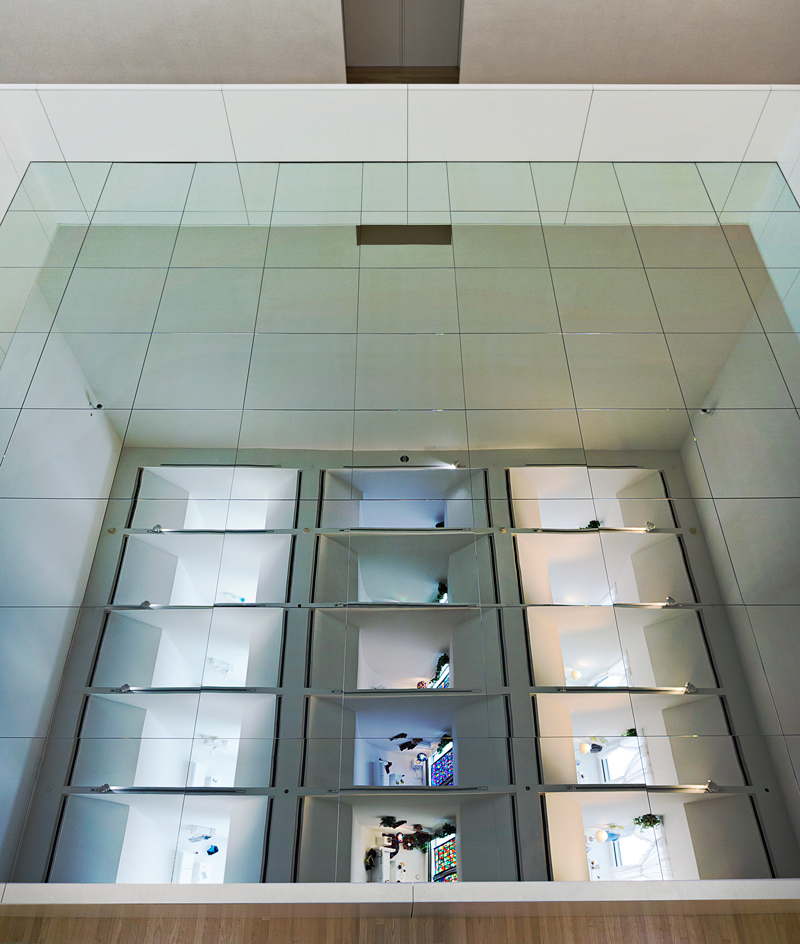 Images of rooms on a mirrored surface