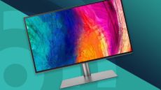 A BenQ PD2725U, our top pick for the best monitor for video editing, against a cyan techradar background