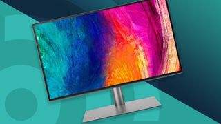 A BenQ PD2725U, our top pick for the best monitor for video editing, against a cyan techradar background