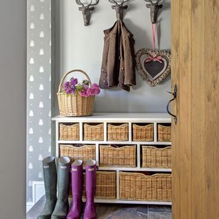 boot room with storage shelves