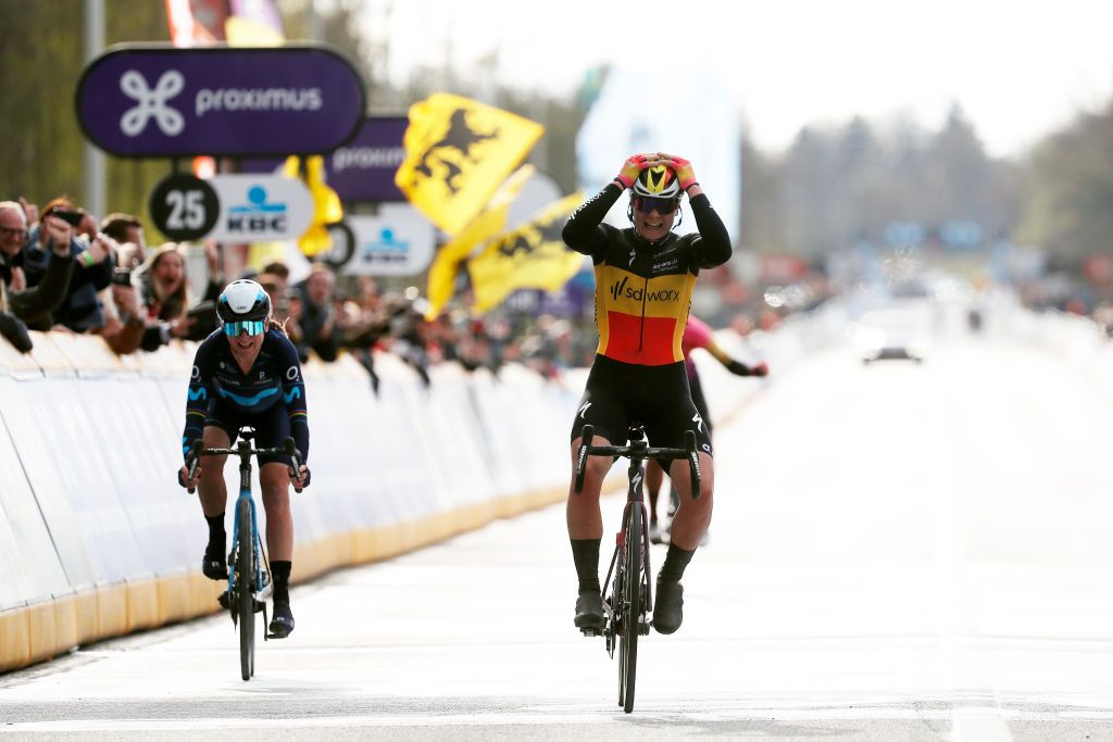 OUDENAARDE BELGIUM APRIL 03 Lotte Kopecky of Belgium and Team SD Worx celebrates winning ahead of Annemiek Van Vleuten of Netherlands and Movistar Team and Chantal Van Den Broek Blaak of Netherlands and Team SD Worx during the 19th Ronde van Vlaanderen Tour des Flandres 2022 Womens Elite a 1586km one day race from Oudenaarde to Oudenaarde RVV22 RVVwomen on April 03 2022 in Oudenaarde Belgium Photo by Bas CzerwinskiGetty Images