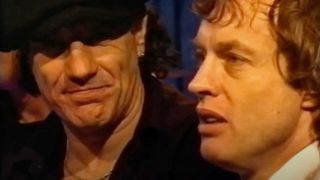 Brian Johnson and Angus Young being interviewed 