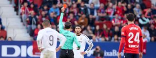 Bellingham of Real Madrid CF receives a red card during the LaLiga EA Sports match between CA Osasuna and Real Madrid CF at Estadio El Sadar on February 15, 2025 in Pamplona, Spain.