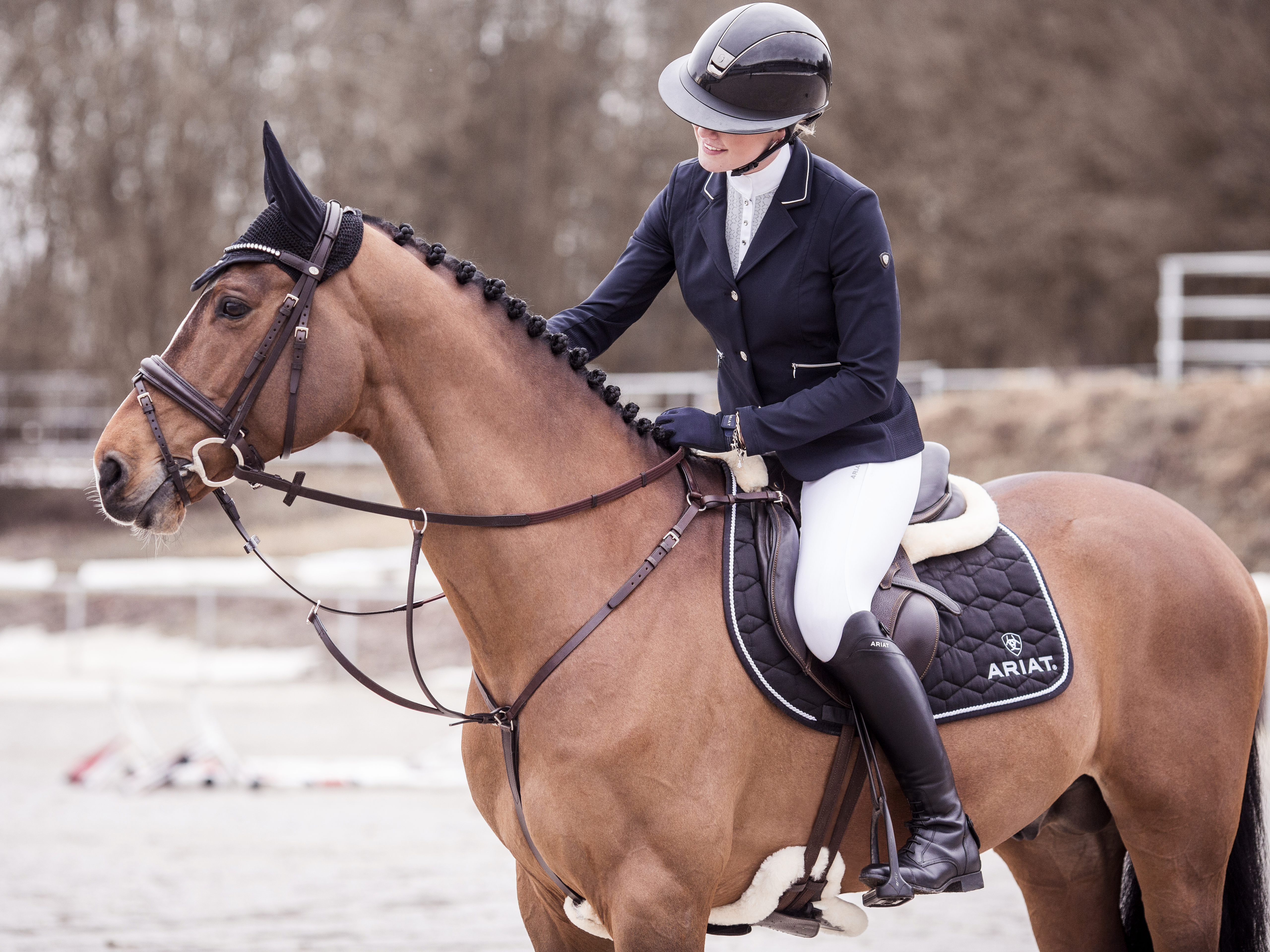 Riding wearing Ariat riding boots