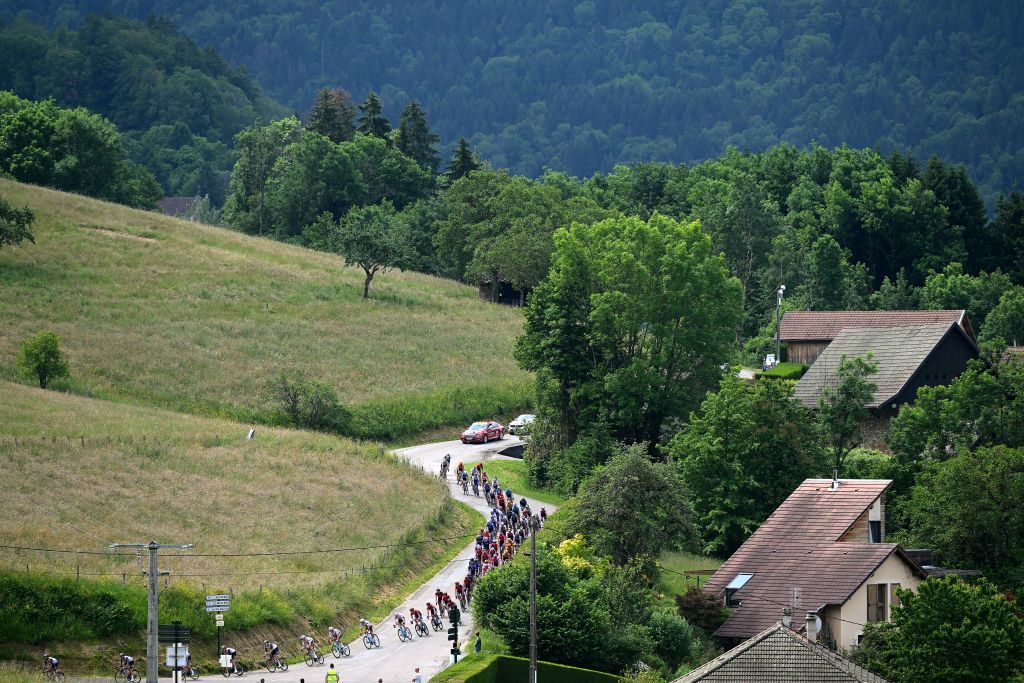 GRENOBLE ALPES MTROPOLE FRANCE JUNE 11 A general view of the peloton competing at the Col de Pinet 806m during the 75th Criterium du Dauphine 2023 Stage 8 a 1528km stage from Le PontdeClaix to La Bastille Grenoble Alpes Mtropole 498m UCIWT on June 11 2023 in Grenoble Alpes Mtropole France Photo by Dario BelingheriGetty Images