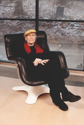 Yrjo Kukkapuro at home on the Karuselli Lounge Chair